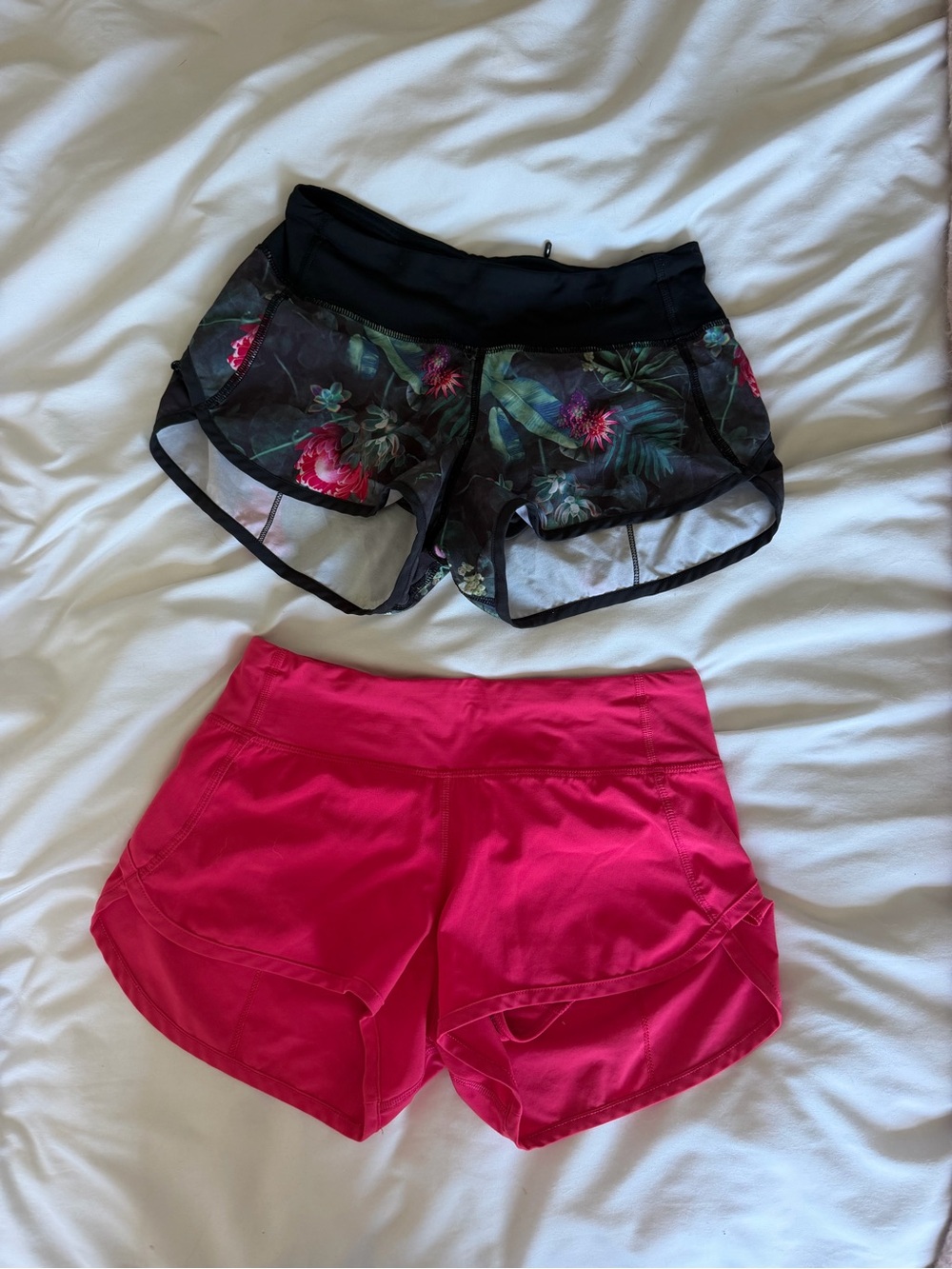 Lululemon athletica Black Floral Print & Bright Pink Athletic Shorts.  2 pairs
